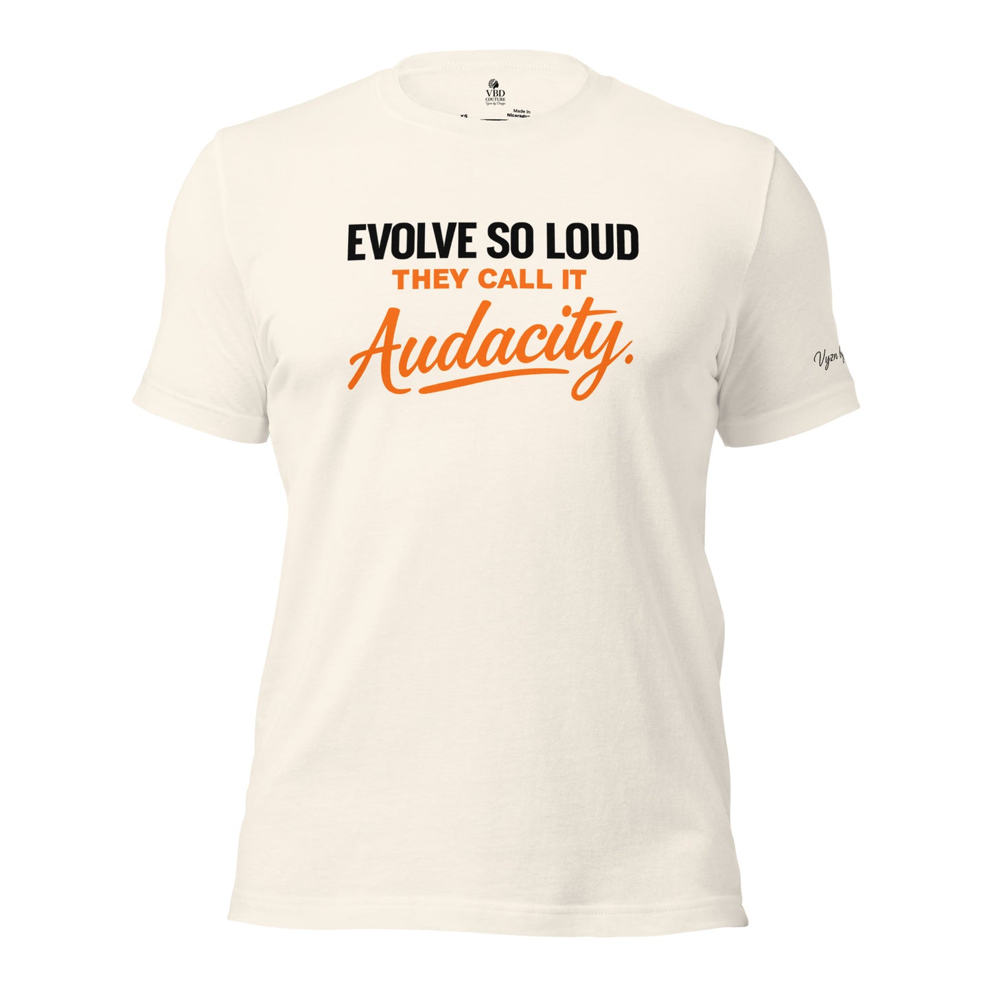 Unisex bone shirt with bold typography reading Evolve So Loud They Call It Audacity by VBD Couture from the Design to Be Different collection